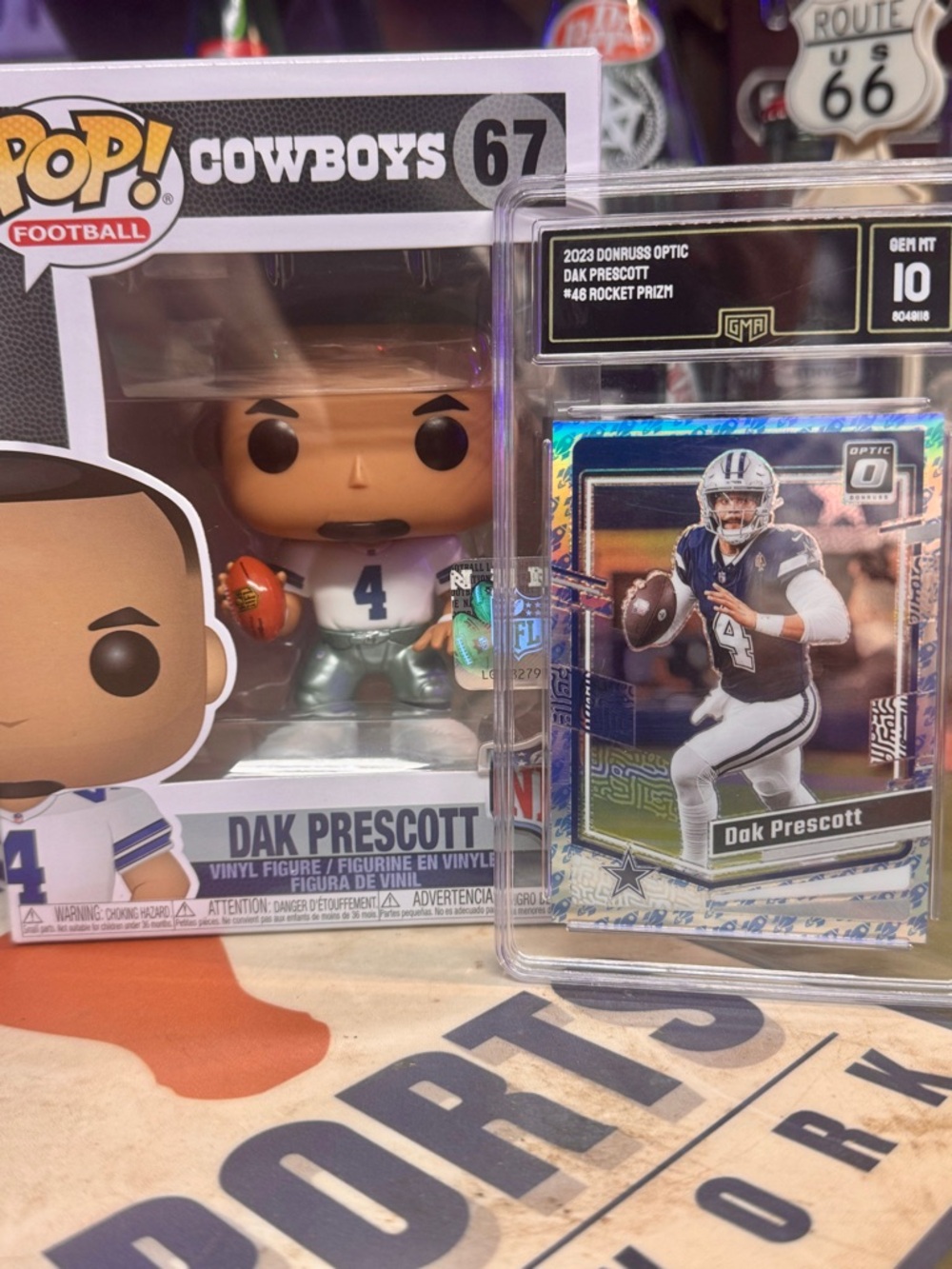 Prizm Optic Dak Prescott grade 10 and a Funko Pop! Take both!